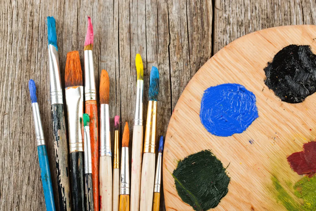 Paint brushes and a painter's palette